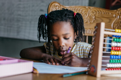 Black girl working on her homework